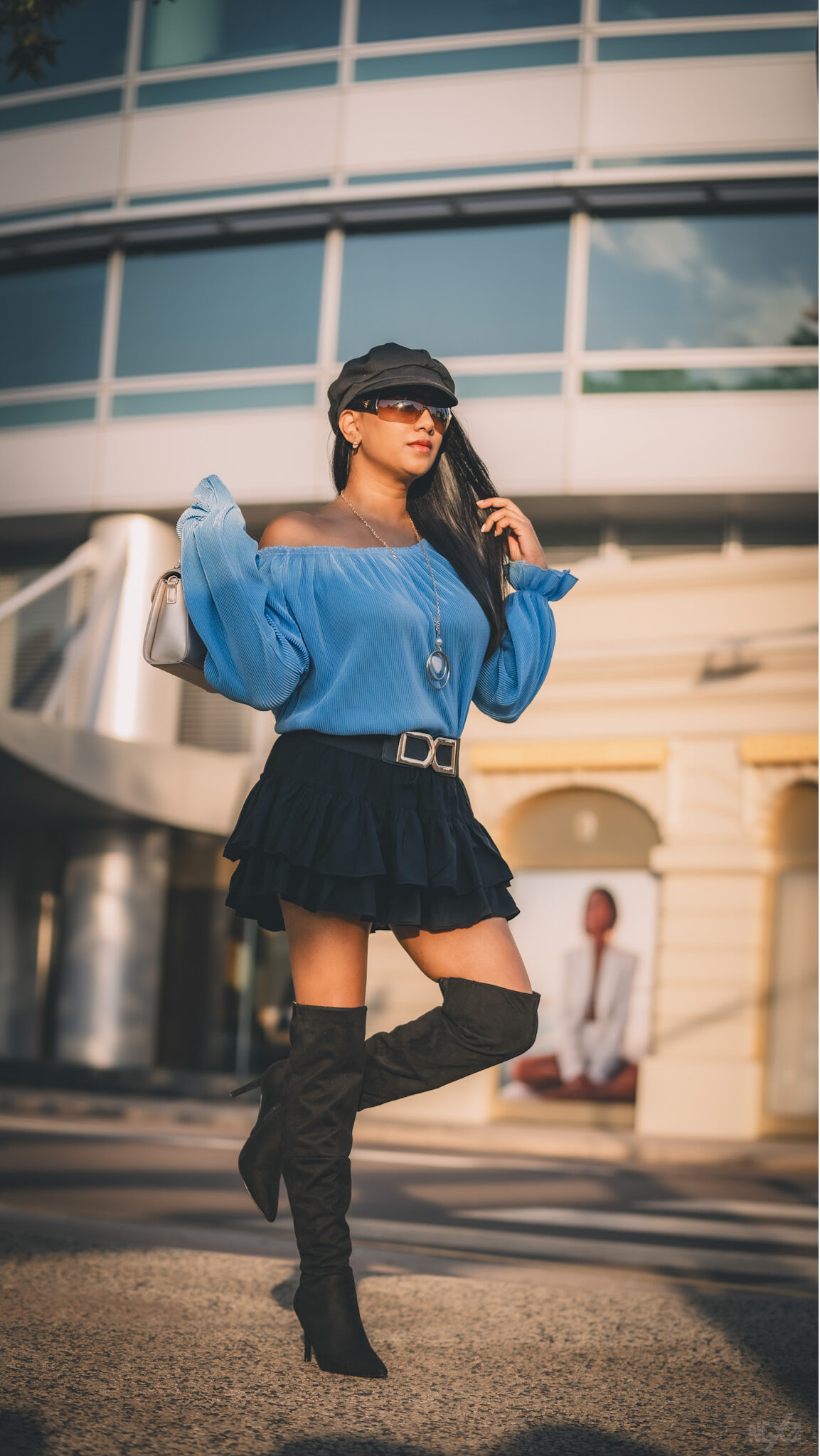 Sunrise portrait shoot in Darwin CBD—soft golden light meets the quiet charm of the waking city.